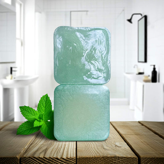 Cool Cadence Natural Soap Two Stacked Front and Back Side sitting on wooden counter.