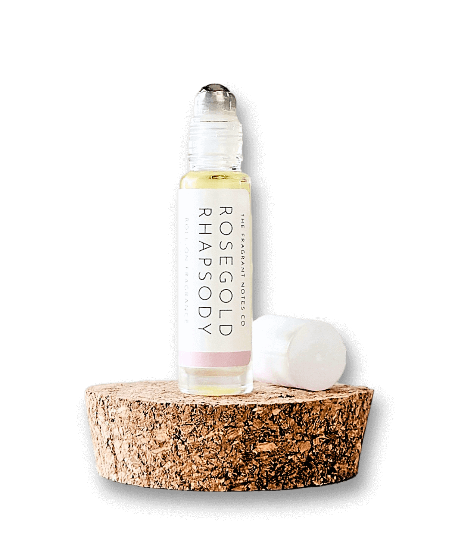 A transparent view of Rosegold Rhapsody Roll-On Fragrance.